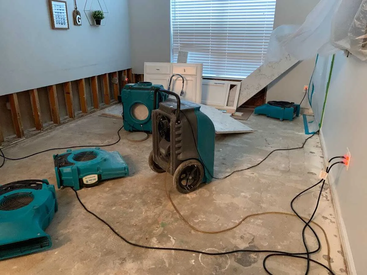 Dehumidifier in flood-cut room for Water Damage Restoration in Town of Pecos